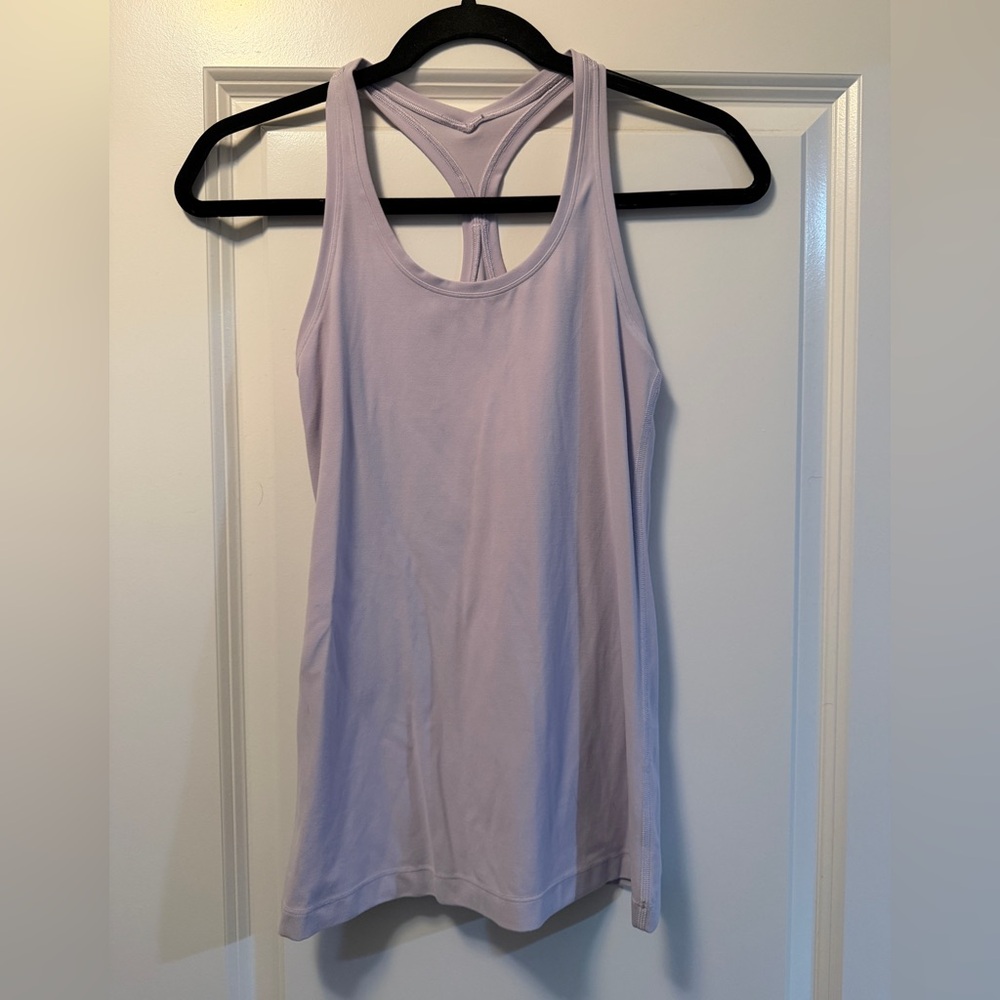 Lululemon Racerback
Tank Top Hip Length in Lavender, size 6